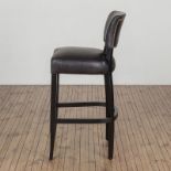 Mimi Bar Stool The modern shaped seat sits on traditional wooden legs to give the barstool an on-