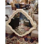 Whitney Mirror Simple and elegant, the undulating rhythm of this oak frame surrounds a lightly