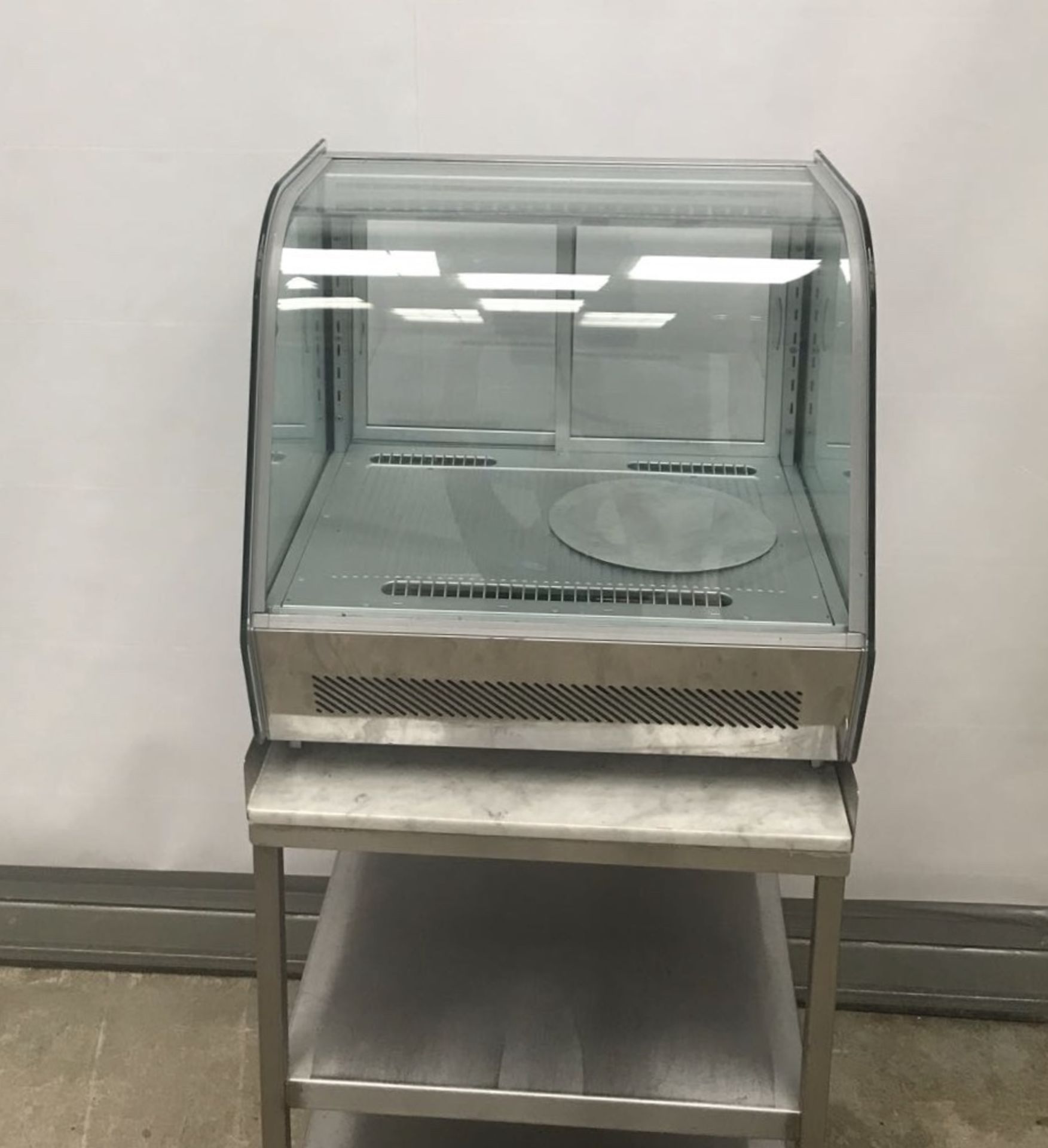 Glass fronted table top display chiller A high quality refrigerated merchandiser, featuring a