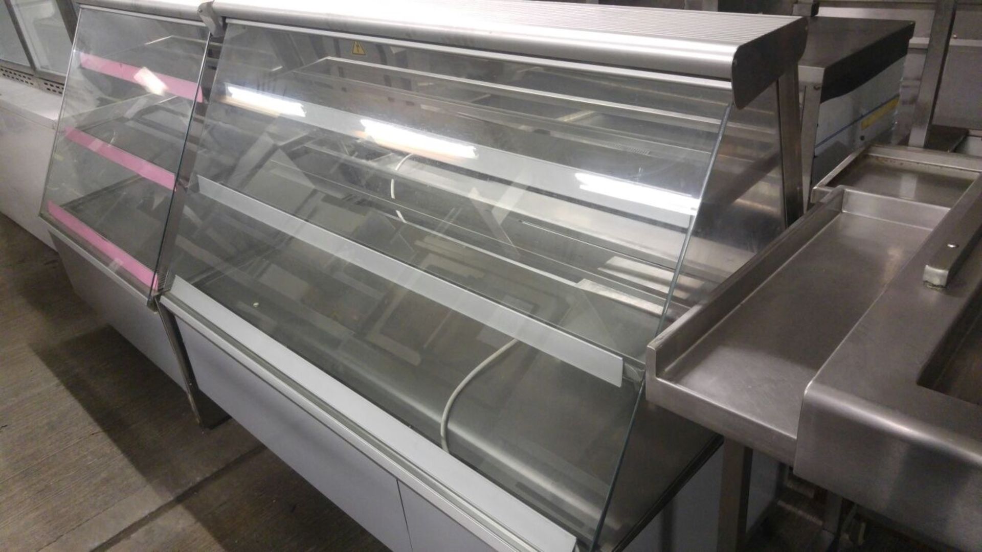 Display unit Refrigerated serve over counter Refrigerated Serve over cabinet with under storage.
