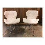 A Pair Of Charles Jacobs Chairs White With Metal Legs The Chair Provides A Crisp, Clean Look To