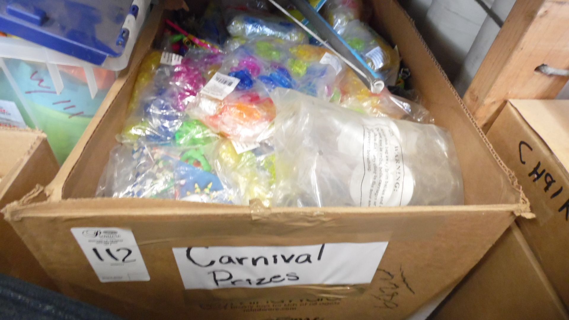 CASE OF CARNIVAL TOYS