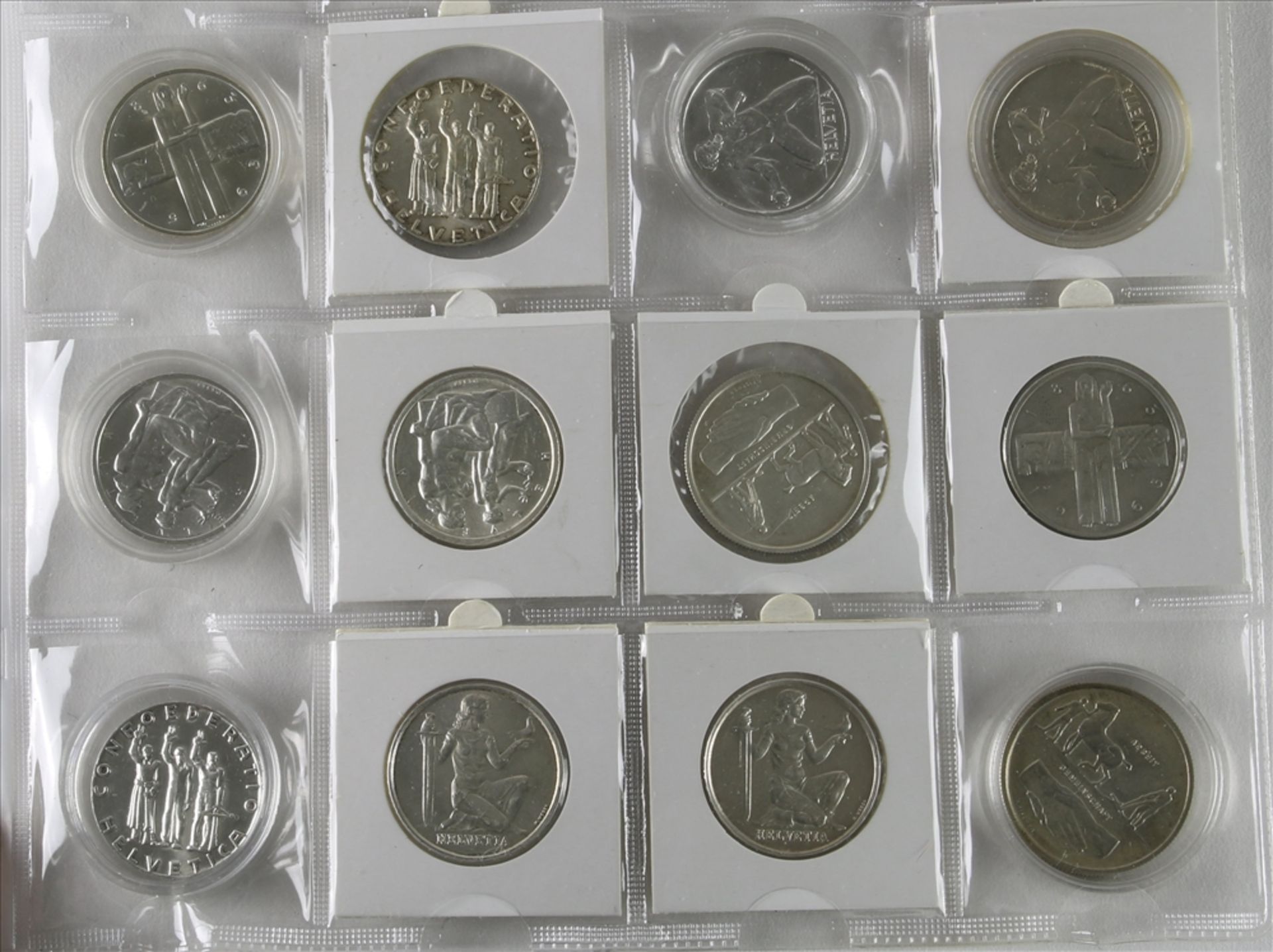 12 Münzen 5-Franken Stücke, Schweiz ab 1963. Unterschiedliche Jahrgänge und Zustände. Von