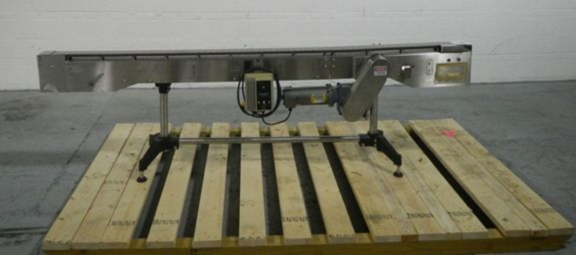 3" wide x 100" long slat conveyor, on stand with .25 hp, dc motor with controller.