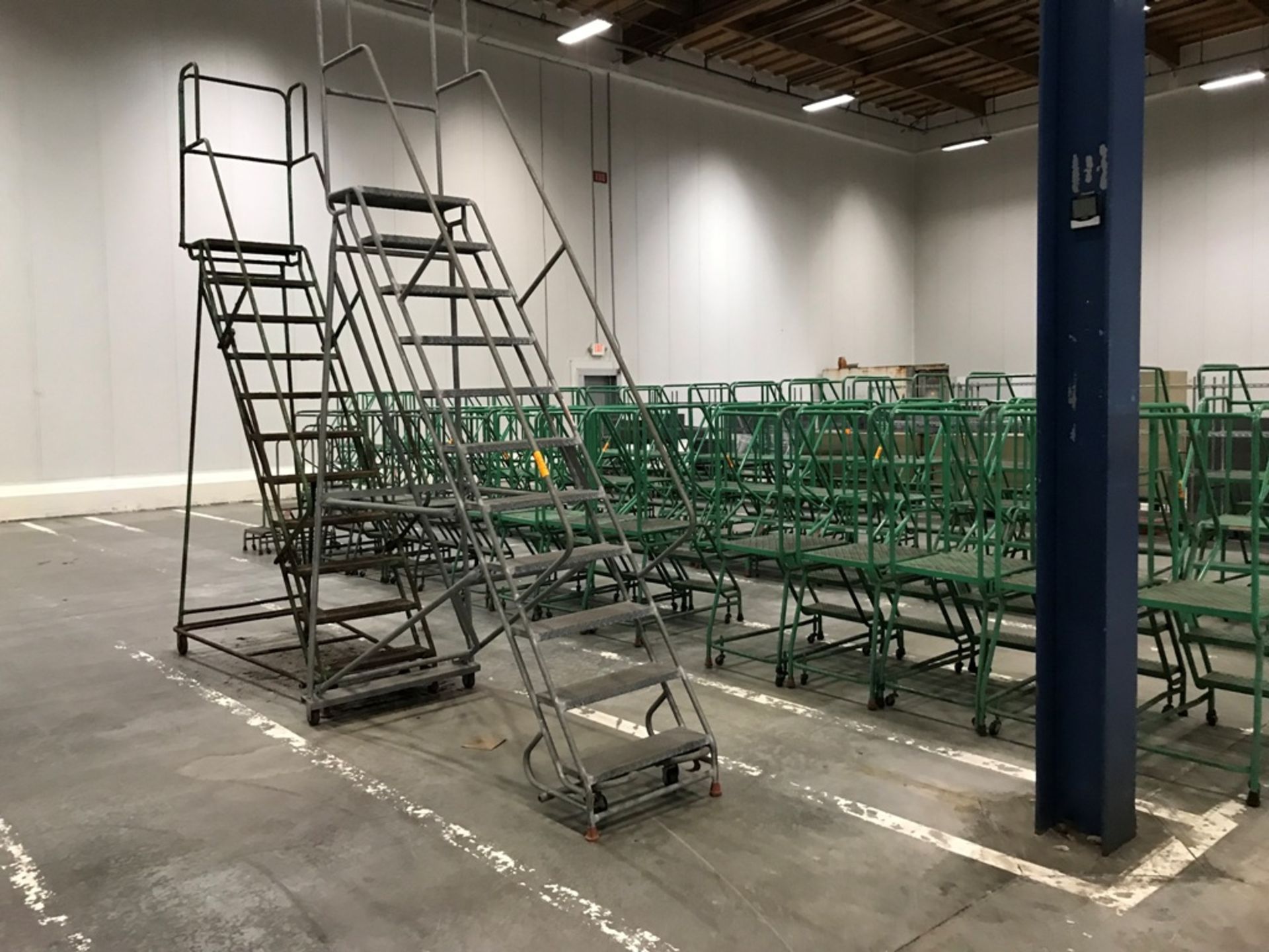 [Lot] (2) 11-step mobile safety ladders, [Location: 12801 Excelsior St., Santa Fe Springs, CA