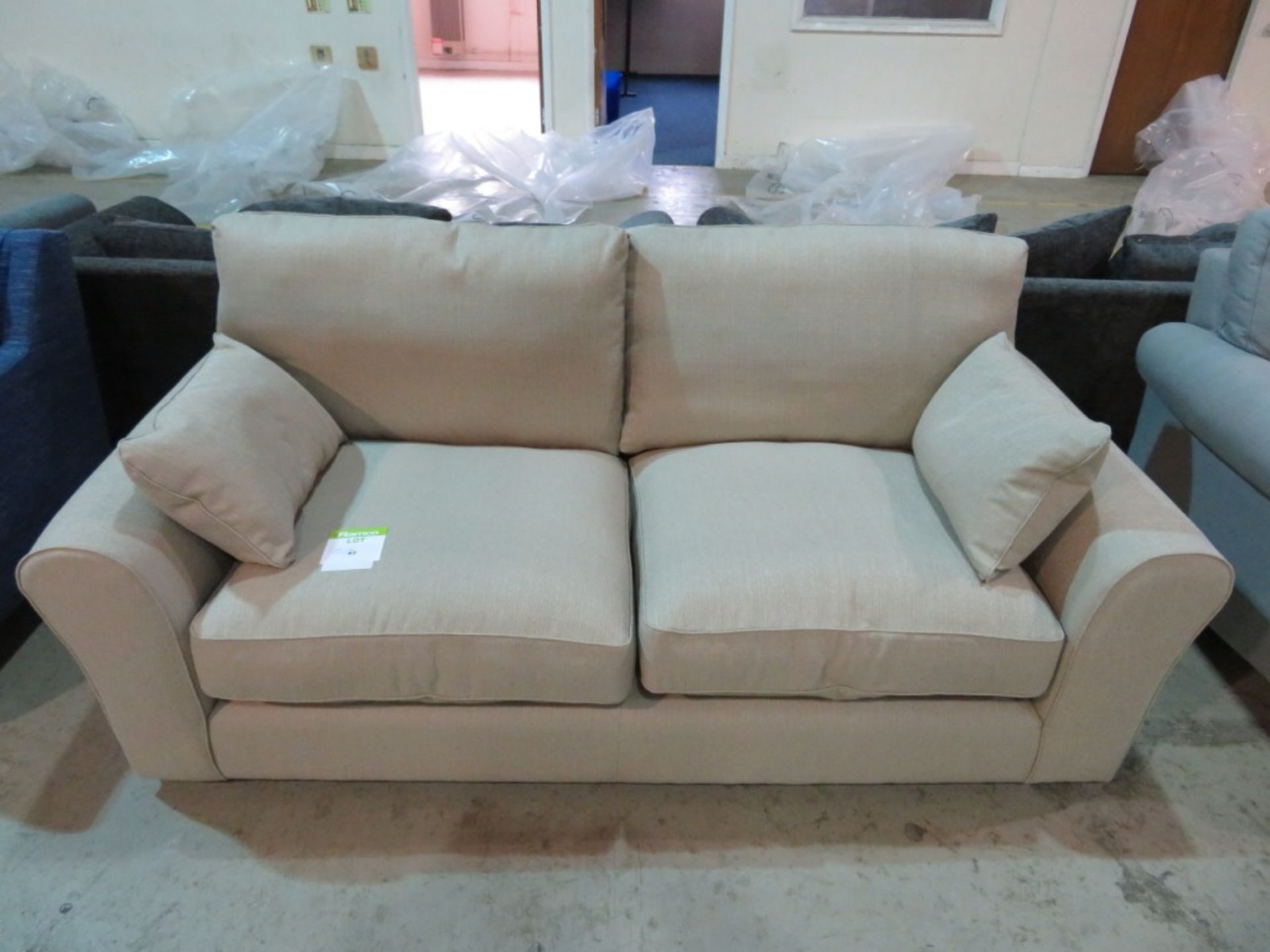 3 Seater beige sofa. Ex Display - 2030 x 980mm (LxD)