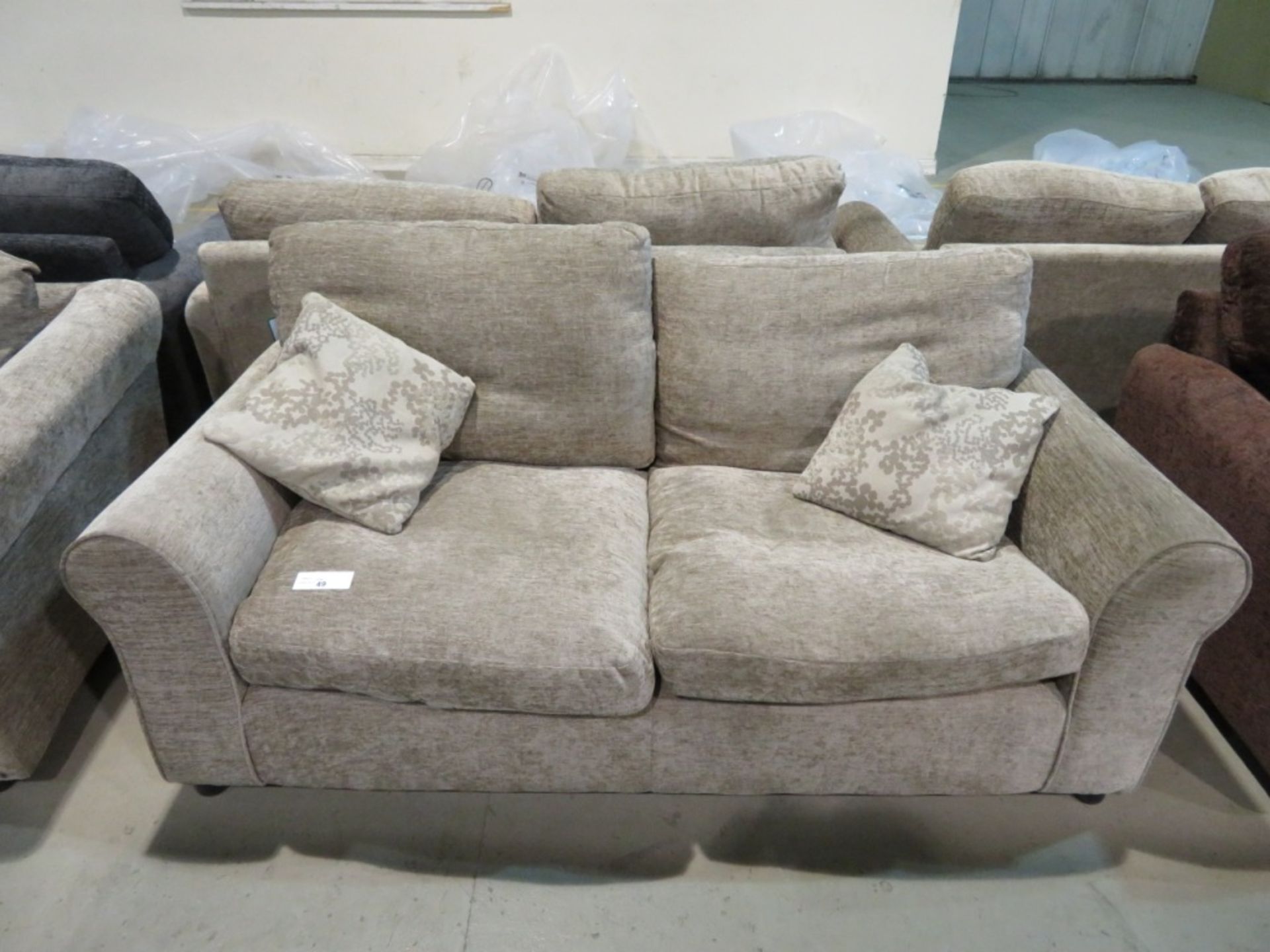 2 Seater beige sofa. Ex Display - 1760 x 860mm (LxD)