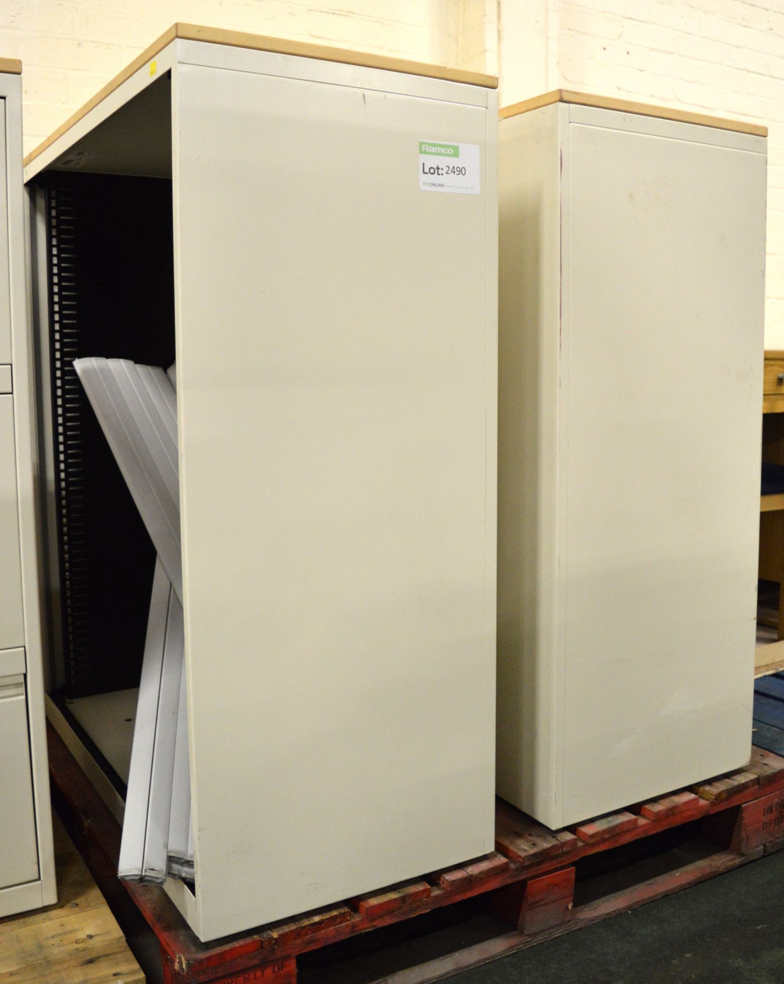 2x Storage Cabinets - Only one set of roller doors working.