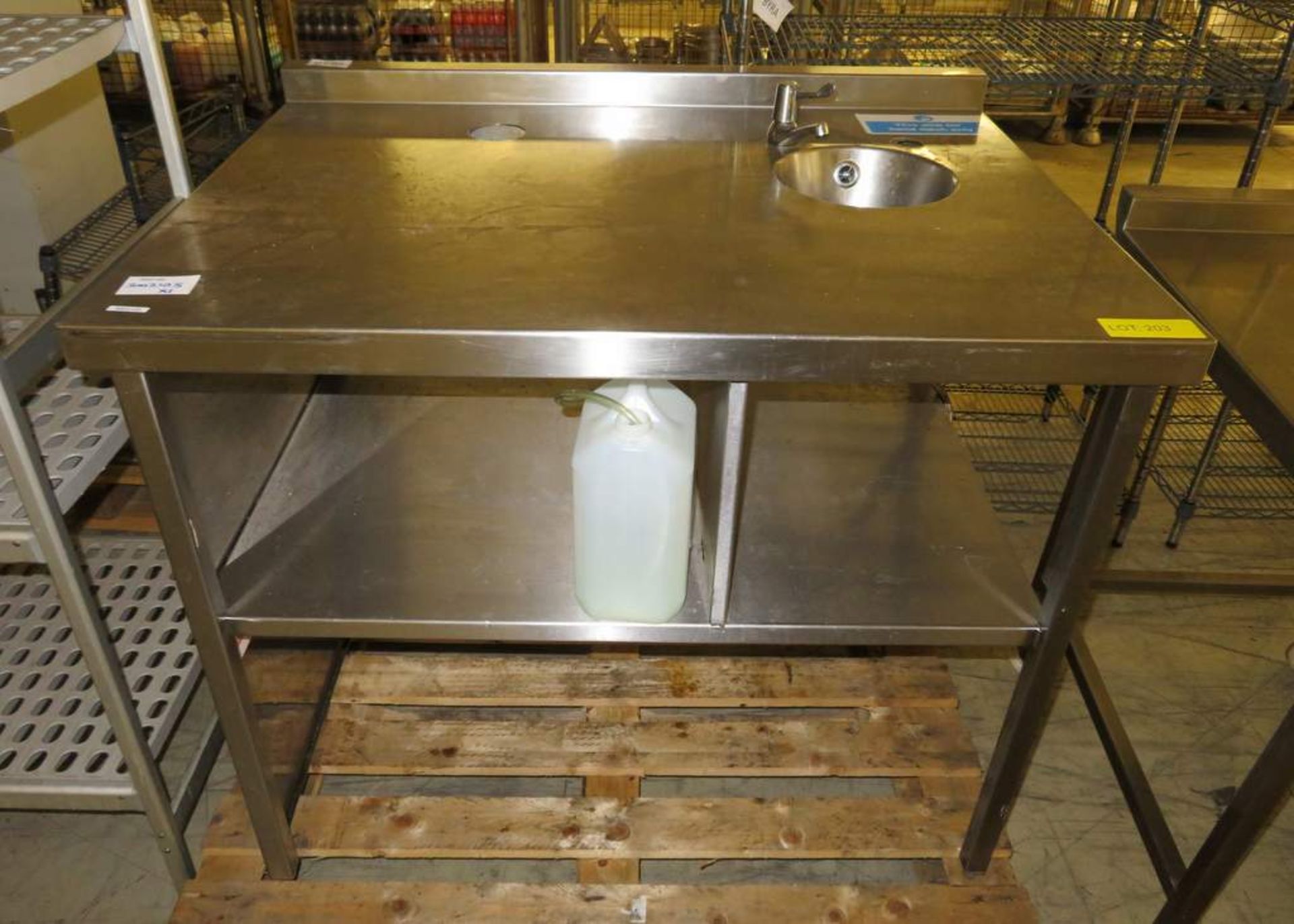 Stainless steel kitchen preparation table with sink