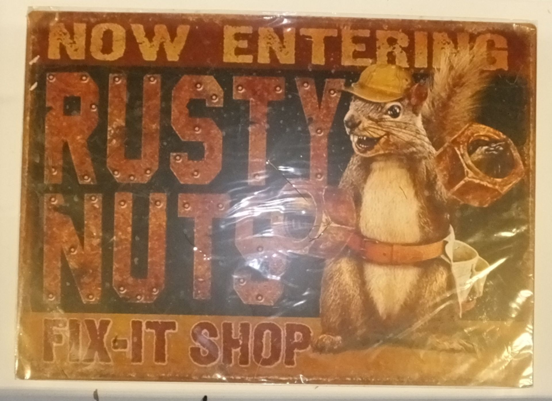 Tin sign - "Rusty Nuts" - Fix-it-shop