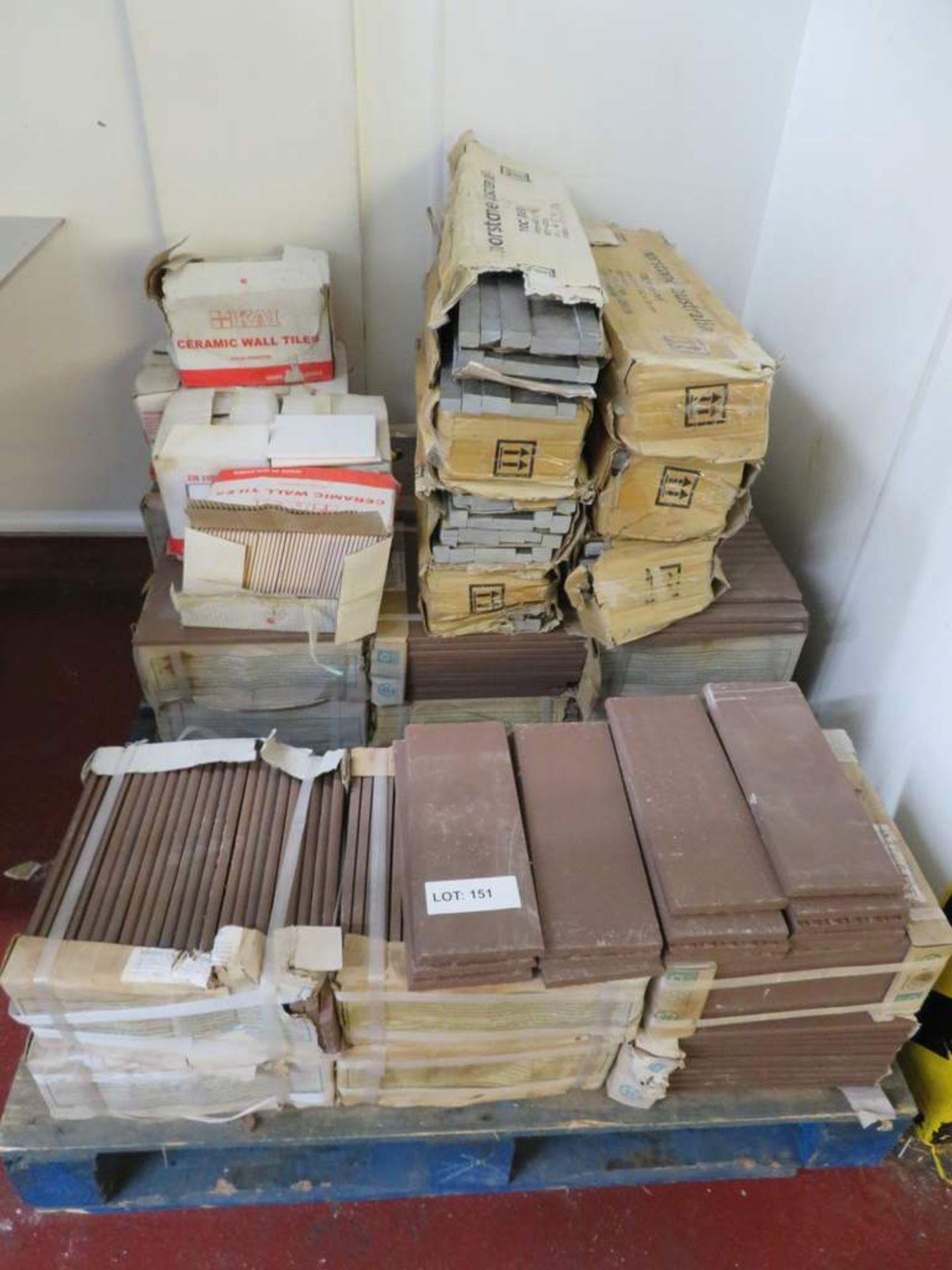 Pallet of various ceramic wall and floor tiles.