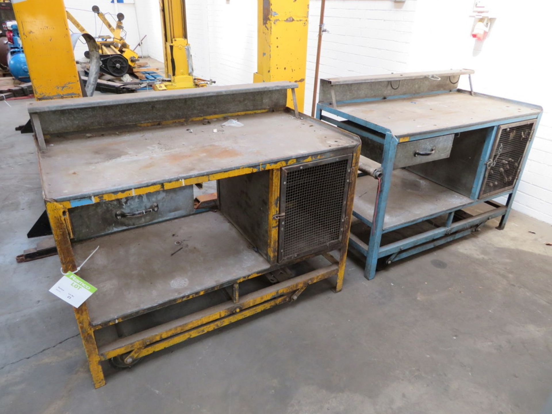 2 x Metal Workbenches with Lowering Wheels