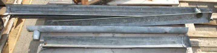 Galvanised guttering sections