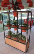 MOBILE THREE TIER FLORAL DISPLAY STAND C/W ARTIFICIAL POTTED PLANTS