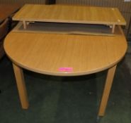 Dining table with extendable section
