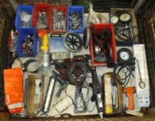 Nuts, bolts, wheels, dial gauges, compressor testers, timing belt