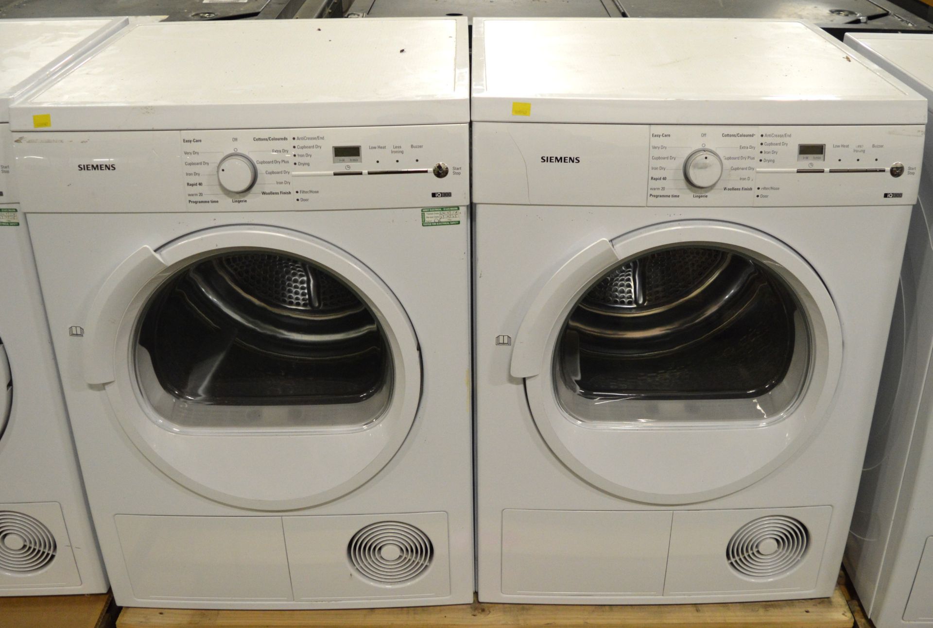 2x Siemens iQ300 Clothes Dryers.