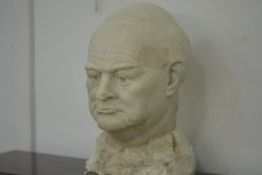 A large plaster bust of Winston Churchill, modelled on an unfinished integral socle, probably a