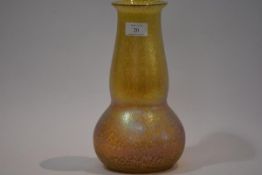 A Continental gold iridescent glass vase, early 20th century, possibly Loetz, of gourd form. 28cm