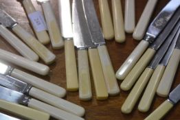 A group of twenty-five bone-handled dinner knives, late 19th/early 20th century