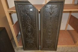 A pair of large cast-iron panels in the Adam taste, rectangular, each centred by a female