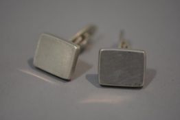 A pair of 1960's Georg Jensen Danish sterling silver cufflinks, each with plain rectangular plaque