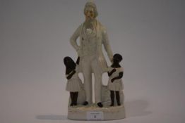 A rare 19th century Staffordshire figure group of John Brown, the American abolitionist, standing