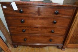 An early Victorian mahogany chest of drawers, the rectangular top over two short and three long