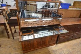 An Art Deco crossbanded burr walnut cocktail cabinet, second quarter of the 20th century, the hinged