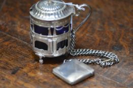 A Mappin & Webb silver vesta case, Birmingham 1914, on a white metal curblink chain; together with a