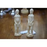 Two early 20th century naively carved ivory tribal figures. Taller 18.5cm