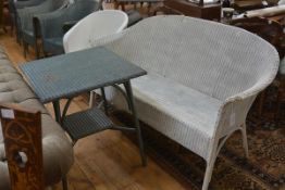 A group of Lloyd Loom furniture comprising: a square table in blue, a white two seater settee and