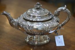 A William IV Scottish silver teapot, James & Walter Marshall, Edinburgh 1830, of flattened spherical