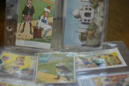 A small group of GB saucy postcards, Chas., Pedro etc, Tuck's Edwardian golfing postcard etc (9)