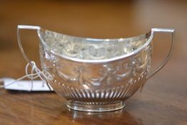 A Victorian twin-handled silver sugar bowl, London 1885, in the Georgian taste, with part fluted