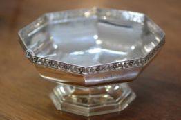 A George V silver fruit bowl, Sheffield 1917, of octagonal form, with pierced floral-cast rim,