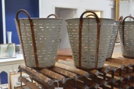 A pair of pierced galvanised twin-handled pails. 44cm by 42cm