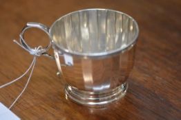 A George V silver christening cup, Birmingham 1927, in the Art Deco taste, with panelled body and