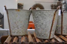 A pair of pierced galvanised twin handled pails. 44cm by 42cm