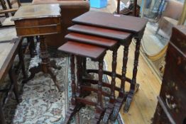 A set of four Chinese Export red lacquer quartetto tables, 19th century, of characteristic form,