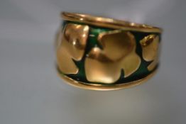 Fred of Paris, a yellow gold and green enamel ring, of tapering form, with stylised leaves against
