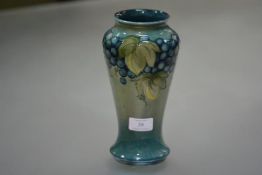 A William Moorcroft vase in the Green Grapes and Vine pattern, of shouldered baluster form,