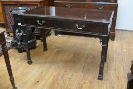 A Chippendale Revival mahogany serving table, early 20th century, the rectangular top over a long