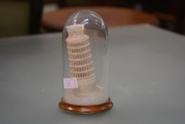 A "Grand Tour" alabaster model of the Leaning Tower of Pisa, contained in a glass dome with wooden