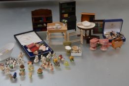 A quantity of 20th century doll's house furniture and accessories including: a group of Victorian