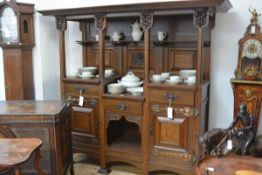 An imposing Scottish oak sideboard in the Art Nouveau taste, c. 1910, Wylie & Lochead, the