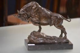 After Antoine-Louis Barye (1796-1875), Charging Bull, a patinated bronze, signed Barye and mounted
