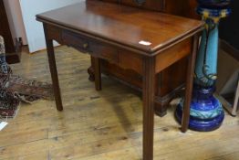 A George III mahogany tea table, late 18th century, the rectangular top above a frieze drawer raised