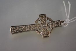 A silver Celtic Cross pendant, in the style of Iona, hallmarked for Birmingham 1937. Length 52mm