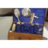 A George V lady's vanity case, by Mappin & Webb, the (partially) fitted interior with a variety of